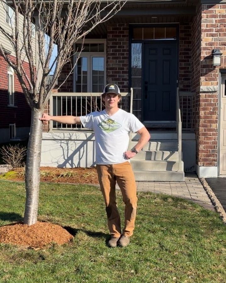 Connor on a lawn-care job in Guelph